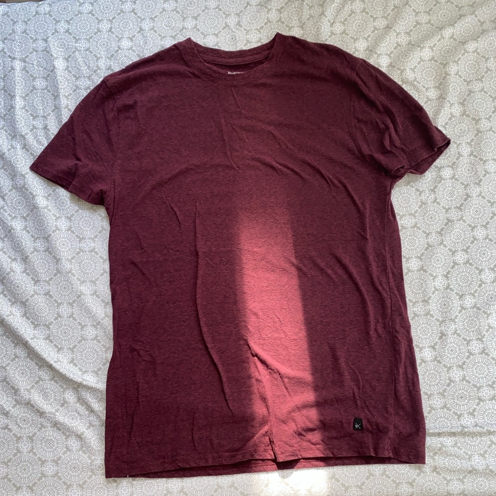 depart west maroon shirt